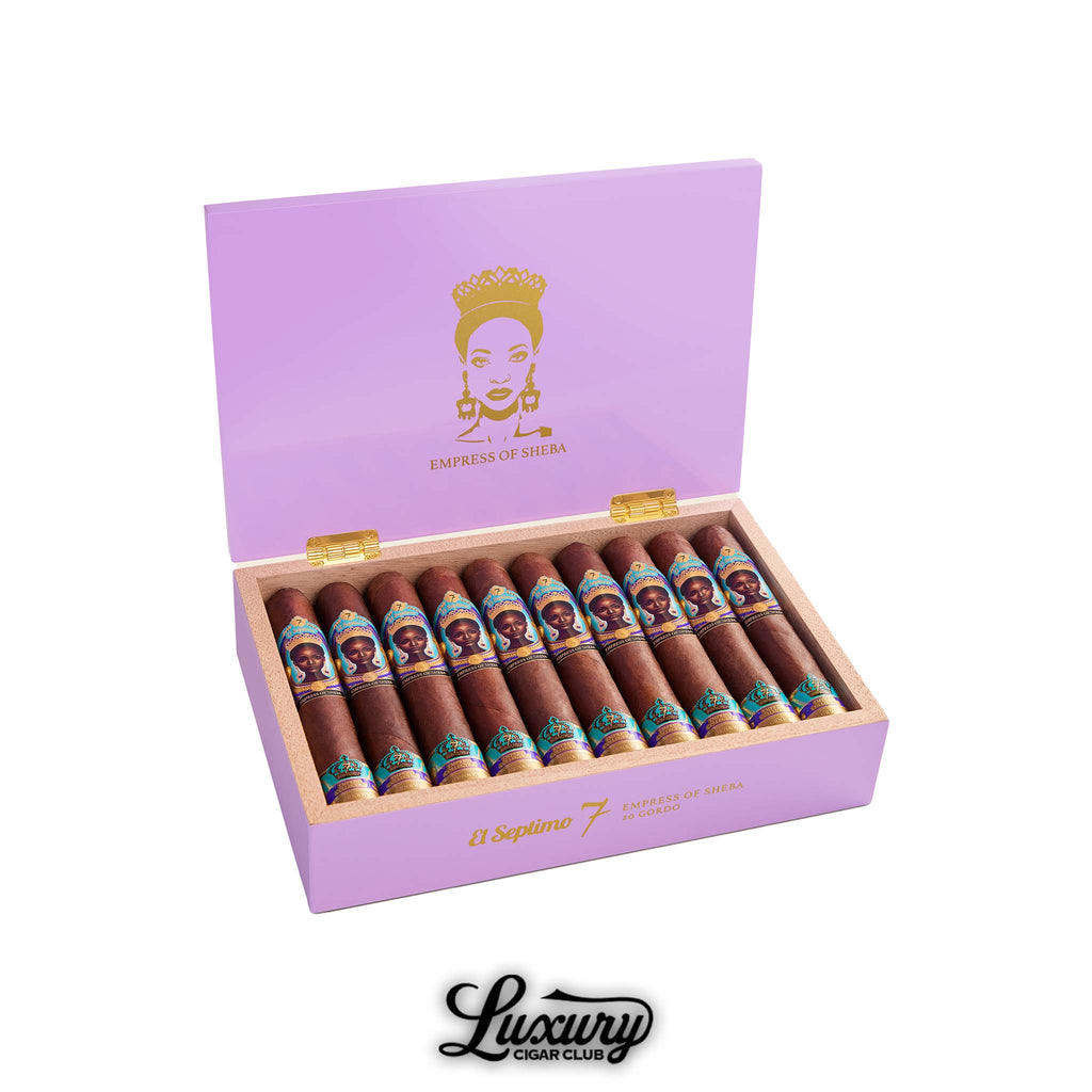 Open box of El Septimo Emperor Collection Empress of Sheba Maduro Gordo cigars with a purple lid, gold artwork, and 20 dark-wrapped cigars lined inside, available at Luxury Cigar Club.