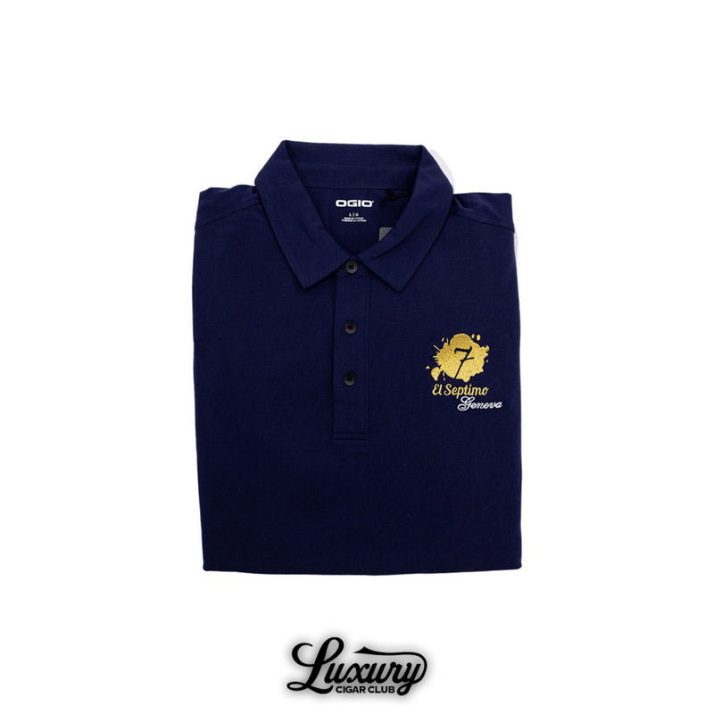 A folded El Septimo OGIO men’s navy polo shirt with gold embroidered logo displayed by Luxury Cigar Club.