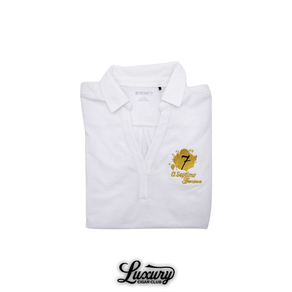 Luxury Cigar Club presents the El Septimo OGIO women’s fitted white polo shirt folded with gold embroidered logo on the chest.