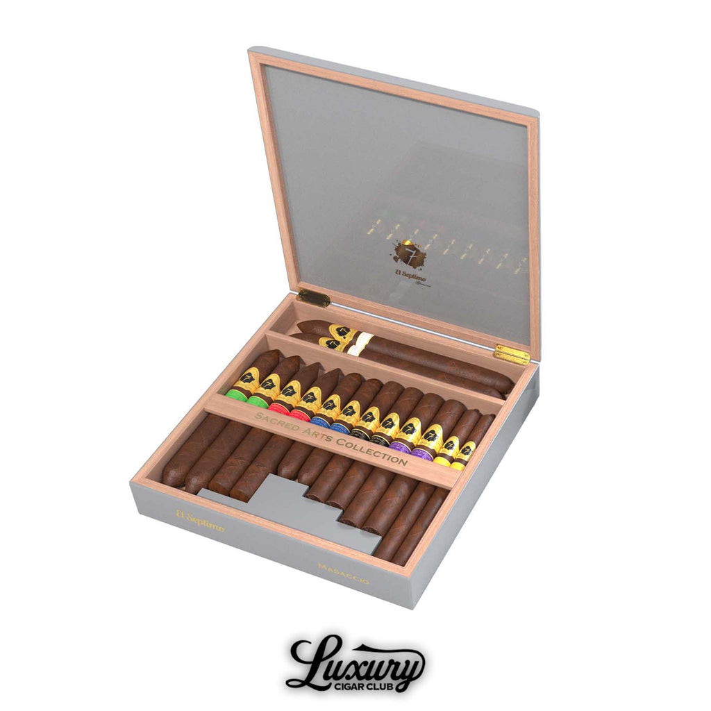 Open luxury cigar box from Luxury Cigar Club featuring the El Septimo Sacred Arts Collection Saint Andrew Sampler with assorted premium cigars in multiple sizes and colorful bands.