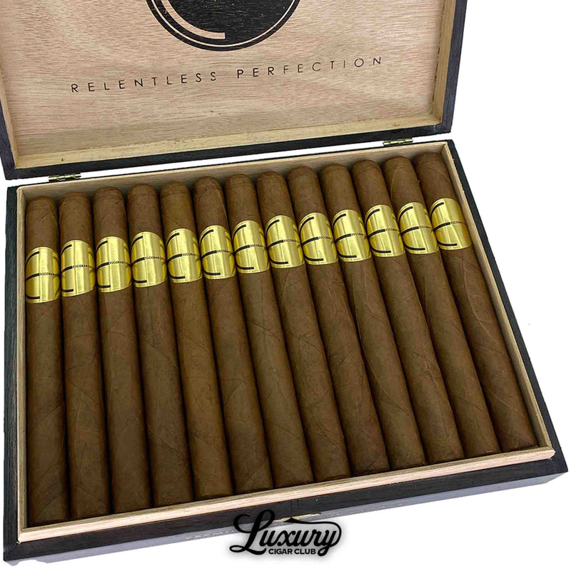 Close up of Escobar Natural Double Corona cigars lined in box with gold embossed bands highlighting premium natural wrapper from Luxury Cigar Club.