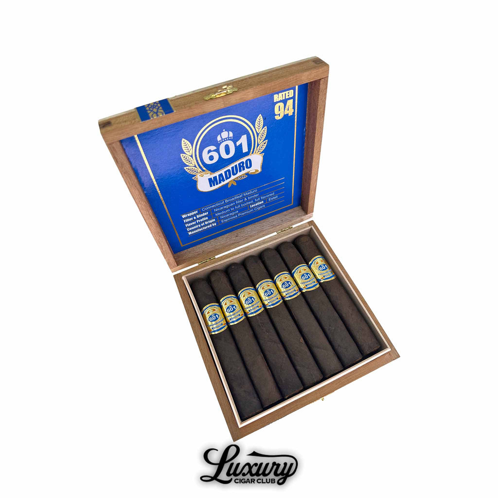 Espinosa 601 Blue Maduro Robusto cigars displayed in an open box with bold blue branding and dark Maduro wrappers, presented by Luxury Cigar Club.