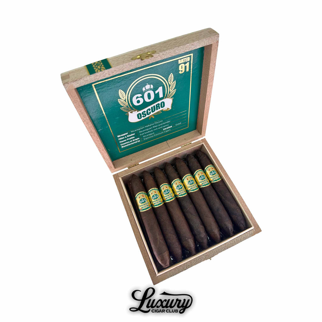 Espinosa 601 Green Oscuro La Punta cigars displayed in a wooden box with deep green branding, presented by Luxury Cigar Club.
