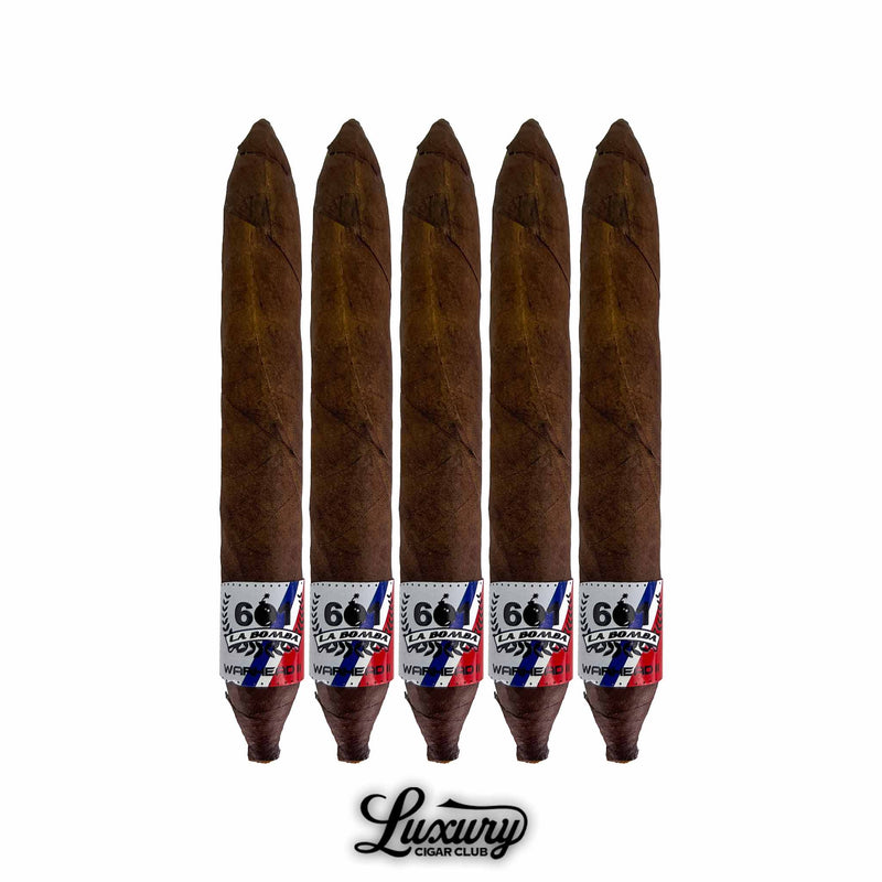 Five 601 La Bomba Warhead II Oval Figurado cigars with dark wrappers and patriotic-themed bands, displayed in a row from Luxury Cigar Club.