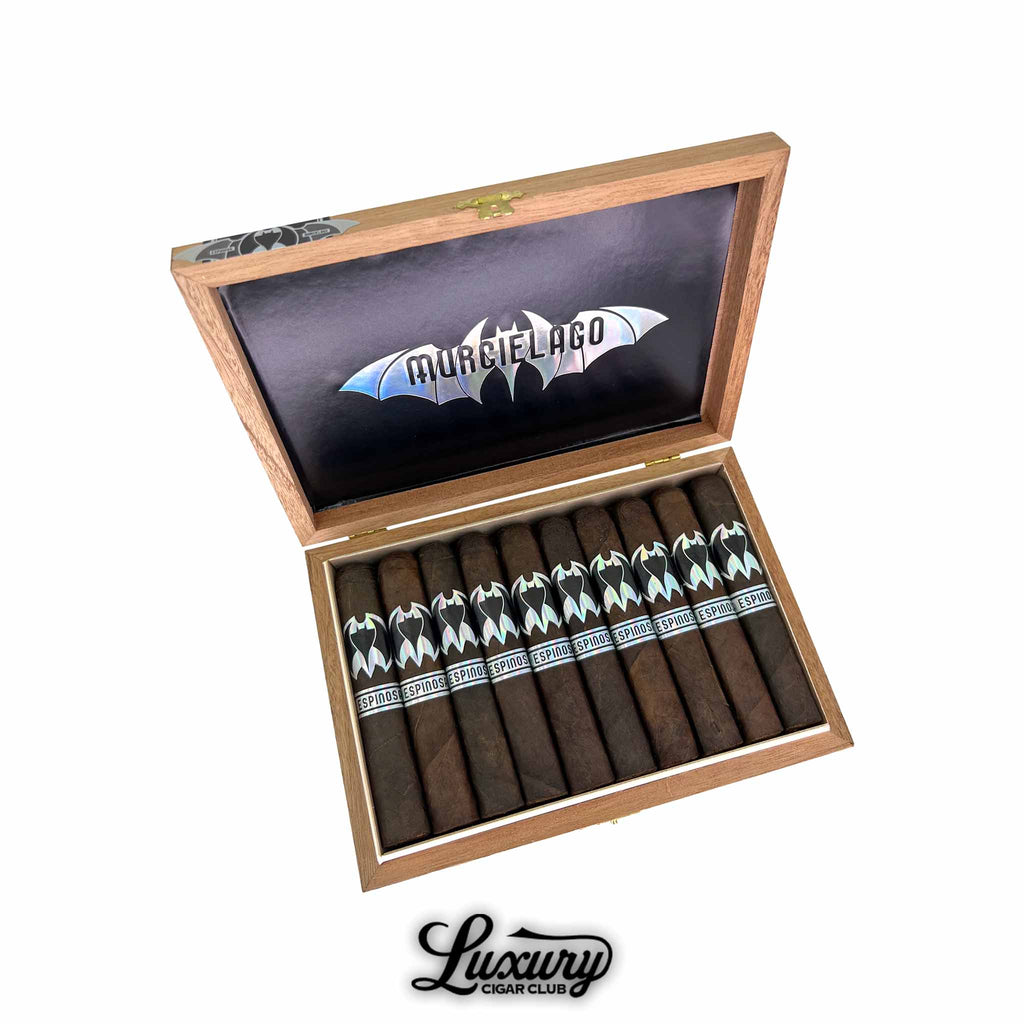 Espinosa Murcielago Robusto Box Press cigars displayed in an open wooden box with sleek black and silver bat-themed branding, presented by Luxury Cigar Club.
