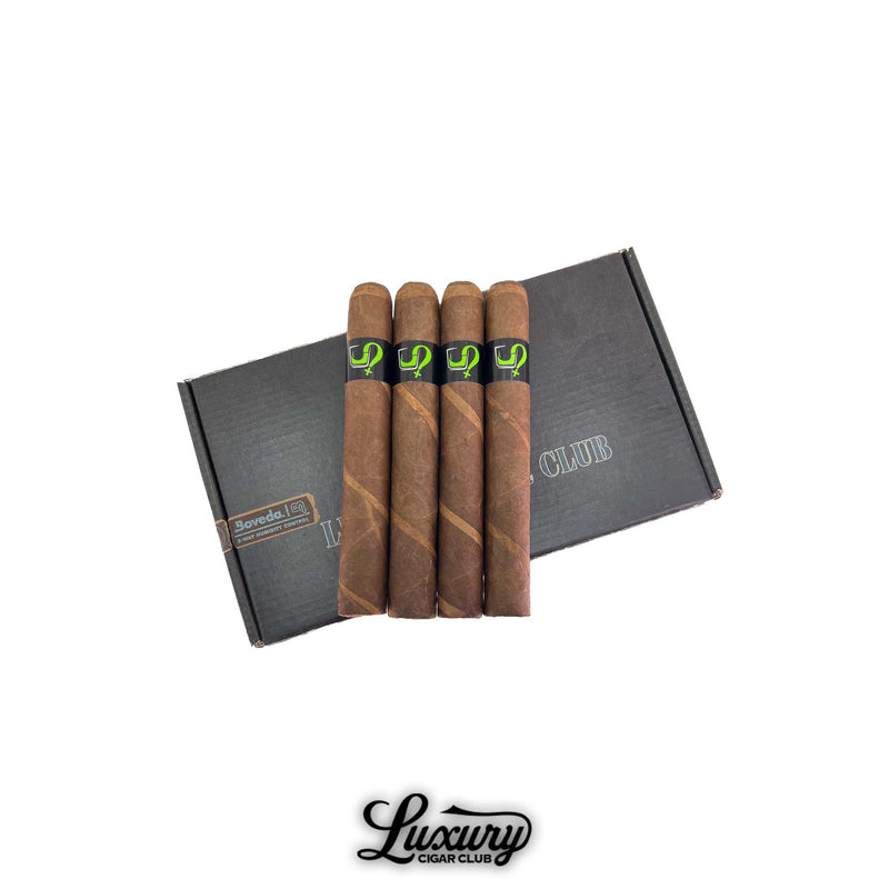 Four Fable Scion Two Things Limited Edition Toro cigars with dark and light barber pole wrappers displayed on a black Luxury Cigar Club box featuring a Boveda humidity pack.