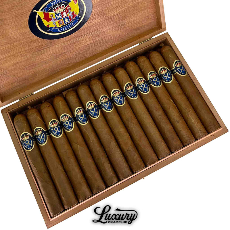Close-up of Felipe Gregorio Classic Mystic Knight cigars neatly arranged in a wooden box with detailed cigar bands, Luxury Cigar Club logo.
