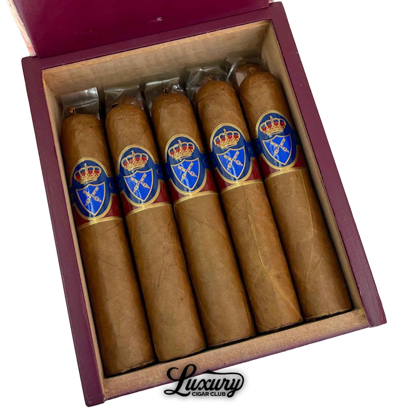 Close-up of Felipe Gregorio Felipe Felipe Magnum 54 cigars showing smooth Connecticut wrappers and regal blue-and-gold bands, featured by Luxury Cigar Club.