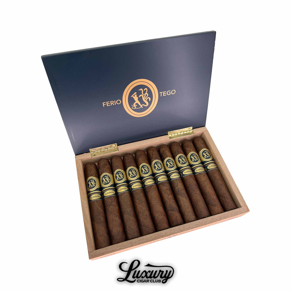 Box of Ferio Tego Summa cigars open with navy blue lid and gold crest logo showcasing premium Dominican and Nicaraguan blend gordos available at Luxury Cigar Club