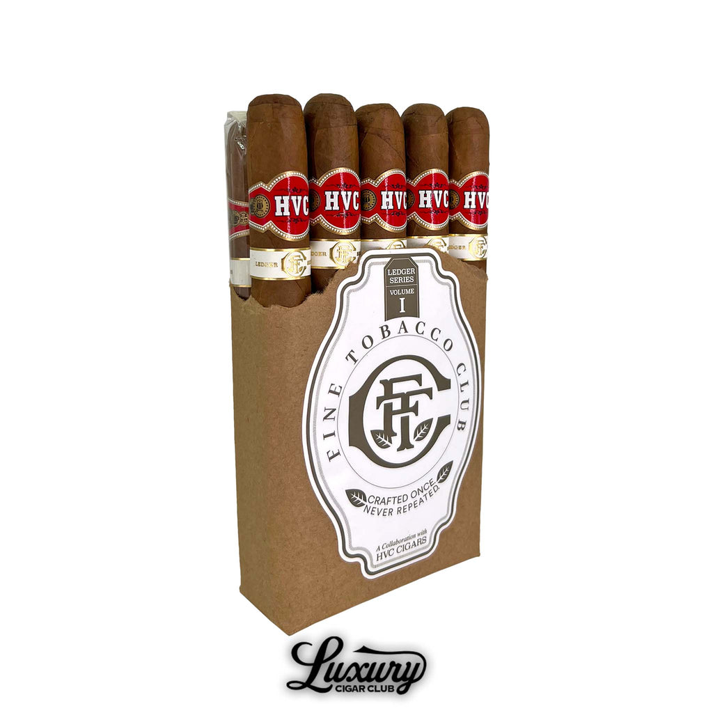Open brown pack of Fine Tobacco Club Ledger Series Volume 1 cigars in collaboration with HVC Cigars showing several cigars with red and gold bands and bold HVC branding Luxury Cigar Club logo beneath