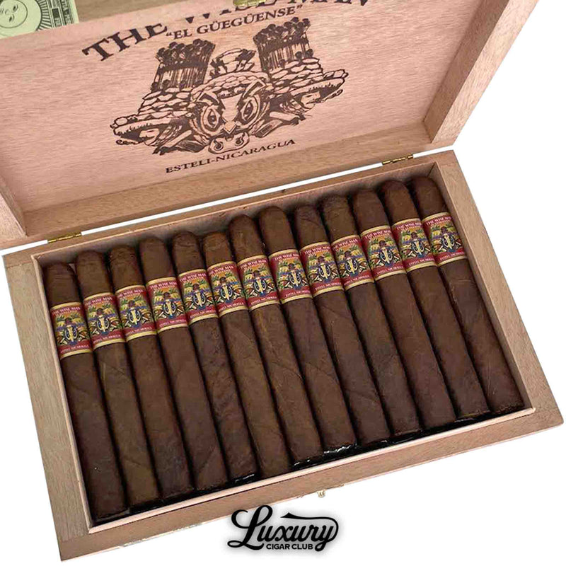 Close-up of Foundation Cigars The Wise Man Maduro Corona Gorda box showing twelve handcrafted cigars with ornate decorative bands at Luxury Cigar Club.