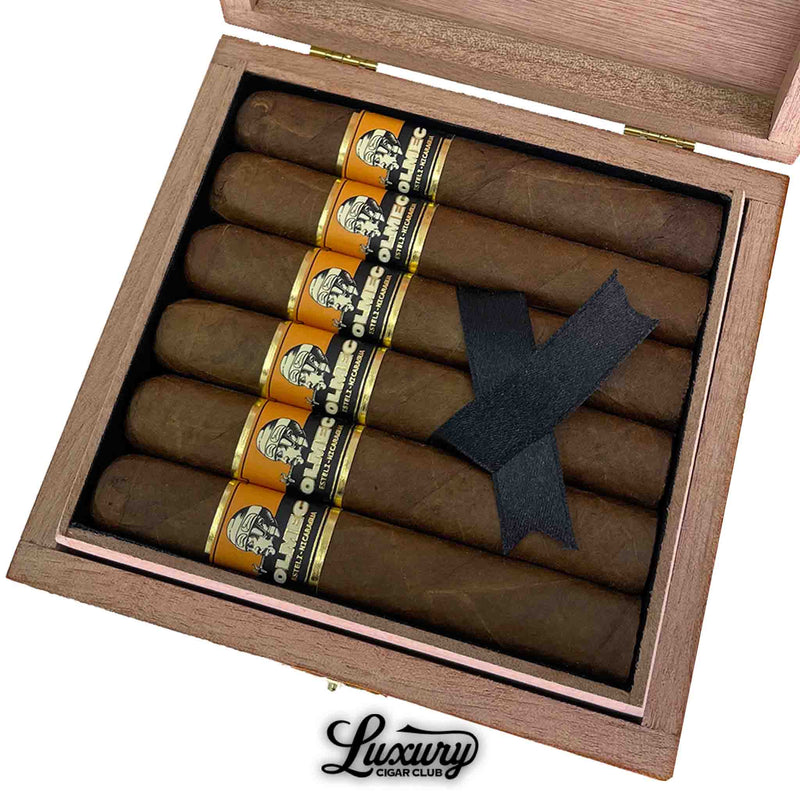 Close-up of Foundation Olmec Claro Robusto cigars in box – premium medium to full-bodied cigars with golden Claro wrapper, handcrafted in Nicaragua, from Luxury Cigar Club