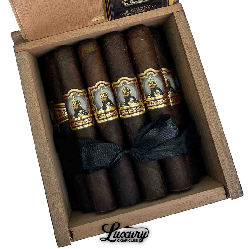 Open box of Foundation The Tabernacle Havana Seed No. 142 Robusto cigars with intricate bands and dark Connecticut wrapper, showcased by Luxury Cigar Club for premium cigar enthusiasts.
