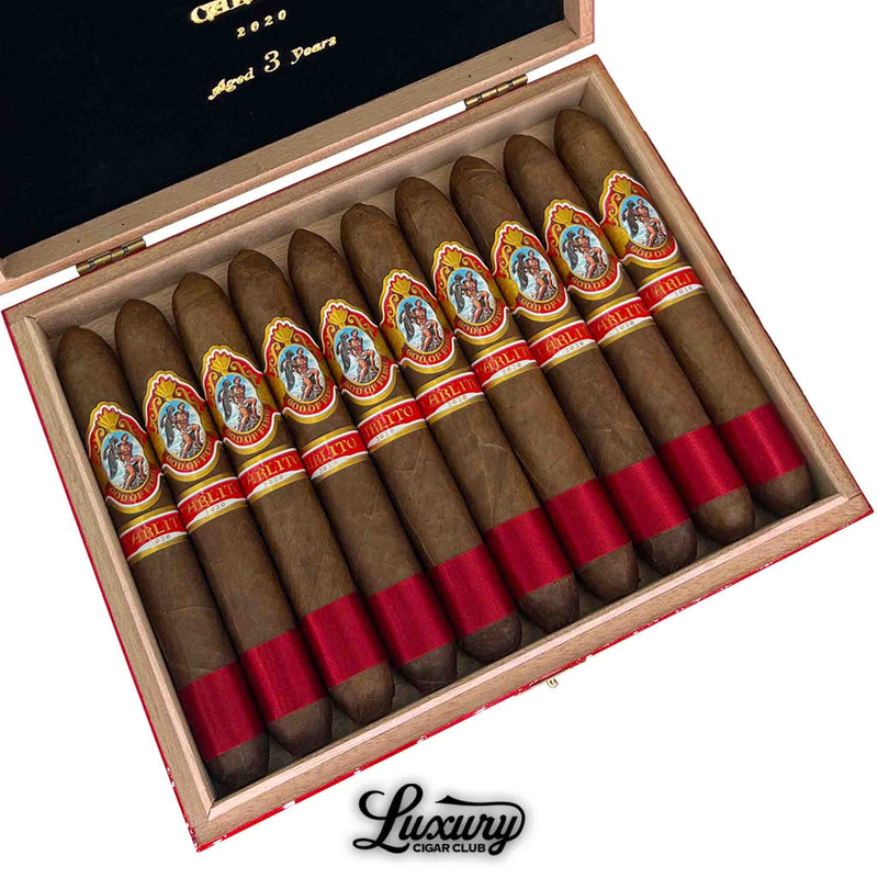 Close-up of God of Fire by Carlito Diademas 56 cigars aged 3 years – ultra-premium figurado cigars by Arturo Fuente with red foot bands and Carlito labels, offered by Luxury Cigar Club