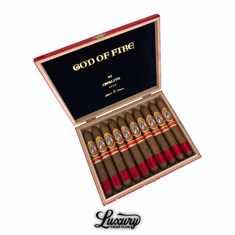 Box of God of Fire by Carlito Diademas 56 cigars aged 3 years – luxury figurado cigars by Arturo Fuente with red foot bands and classic Carlito artwork, available at Luxury Cigar Club