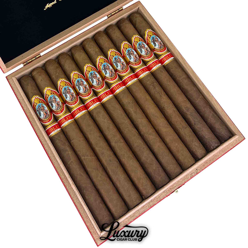 Close-up of God of Fire by Carlito Double Corona 2020 cigars aged 3 years – ultra-premium long-format cigars by Arturo Fuente with natural wrapper and red Carlito bands, available at Luxury Cigar Club