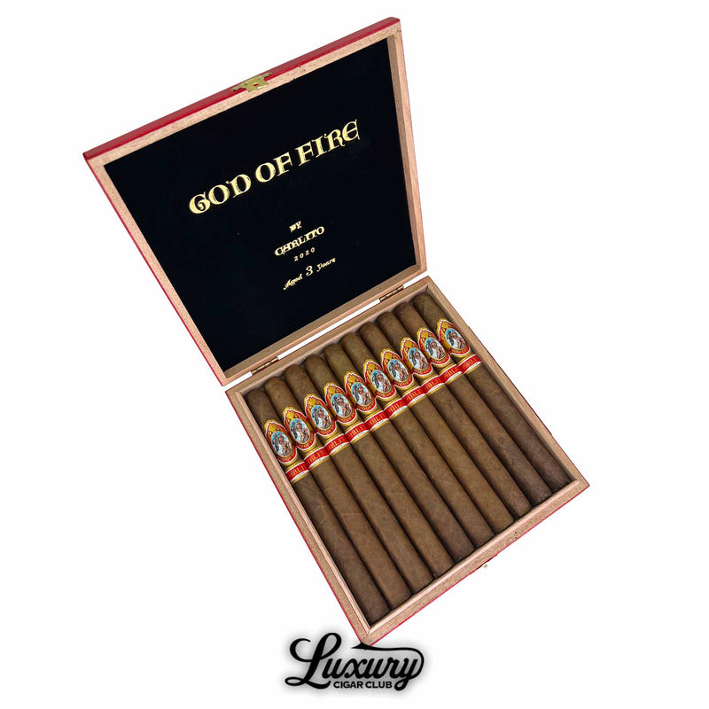 Box of God of Fire by Carlito Double Corona 2020 cigars aged 3 years – luxury long-format Arturo Fuente cigars with golden-brown wrapper and red Carlito bands, from Luxury Cigar Club