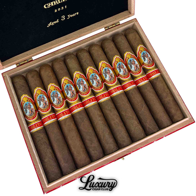 Close-up of God of Fire by Carlito Double Robusto 2021 cigars aged 3 years – premium Arturo Fuente cigars with smooth natural wrapper and red Carlito band, offered by Luxury Cigar Club
