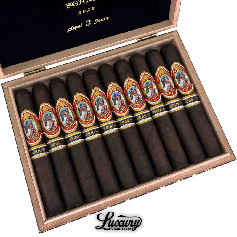 Close-up of God of Fire Serie B Robusto 2020 cigars aged 3 years – dark-wrapped premium cigars by Arturo Fuente with ornate red and gold bands, available at Luxury Cigar Club