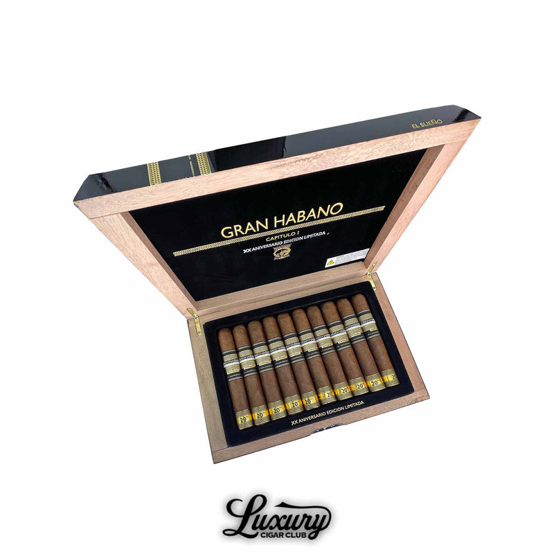 Gran Habano 20th Aniversario Capitulo I El Sueño box open showing cigars arranged in rows with black and gold branding, Luxury Cigar Club