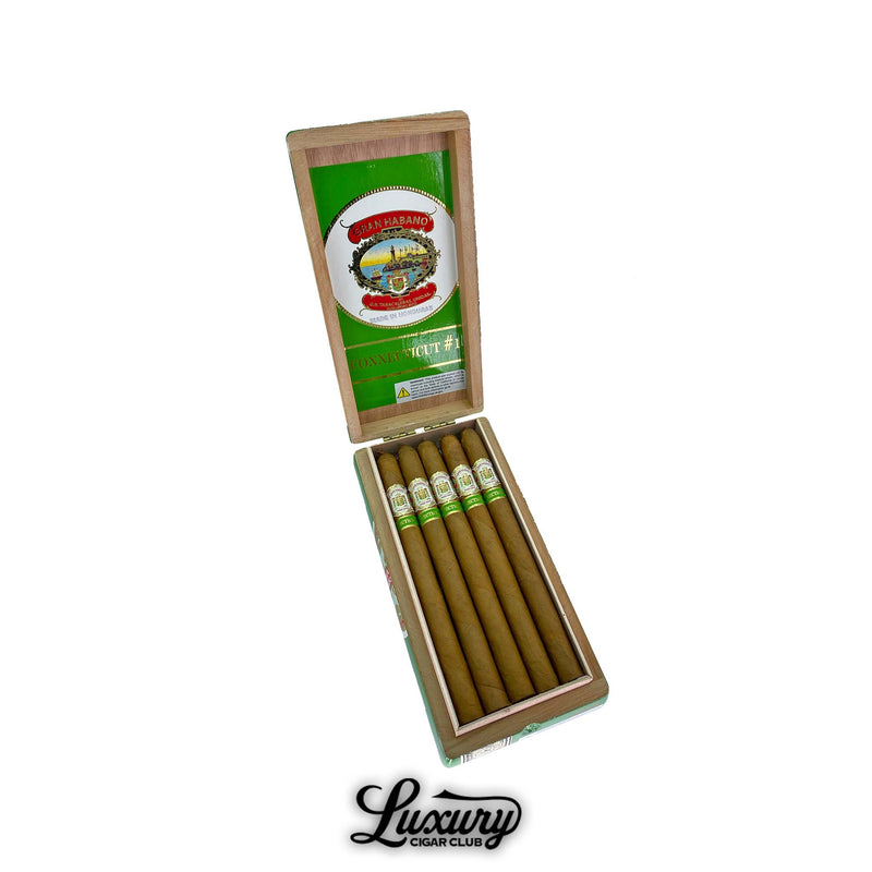 Open green and wooden box of Gran Habano Connecticut No. 1 Lancero cigars featuring five long, slender cigars with light Connecticut wrappers and green-accented bands. Luxury Cigar Club logo displayed below.