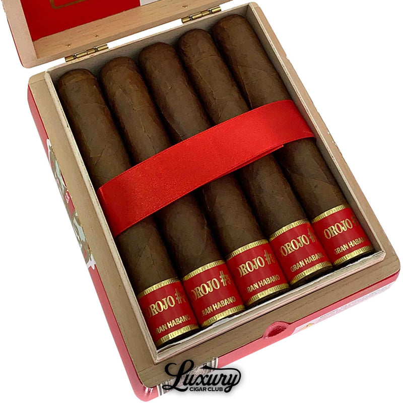 Close up view of five Gran Habano Corojo No. 5 Imperial cigars with red and gold Corojo #5 bands arranged in a row inside the box, presented by Luxury Cigar Club.