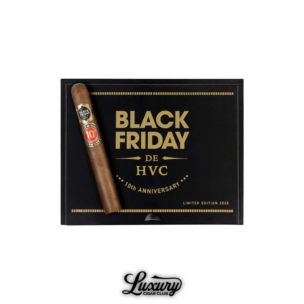 HVC Black Friday 2025 Limited Edition 10th Anniversary cigar displayed on top of a sleek black and gold box with bold lettering, photographed for Luxury Cigar Club.