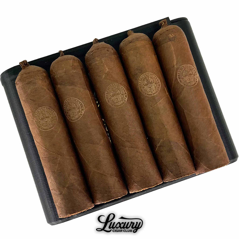 Close-up of Henk Maori Gaudini cigars highlighting wrapper texture and luxury packaging, featured by Luxury Cigar Club.