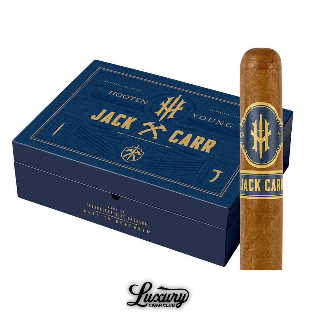 Hooten Young Jack Carr Edition Toro cigar and box displayed elegantly, featuring a bold navy and gold design with Jack Carr branding, crafted at Tabacalera Diaz Cabrera and showcased by Luxury Cigar Club.