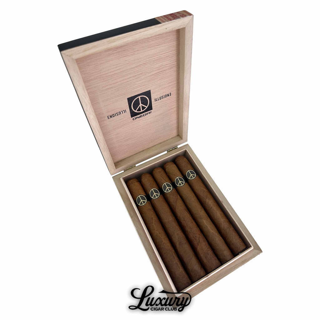 Illusione OneOff Black and Tan Toro Limited Edition cigar box fully opened, displaying five cigars with peace sign bands and branded interior lid, from Luxury Cigar Club.