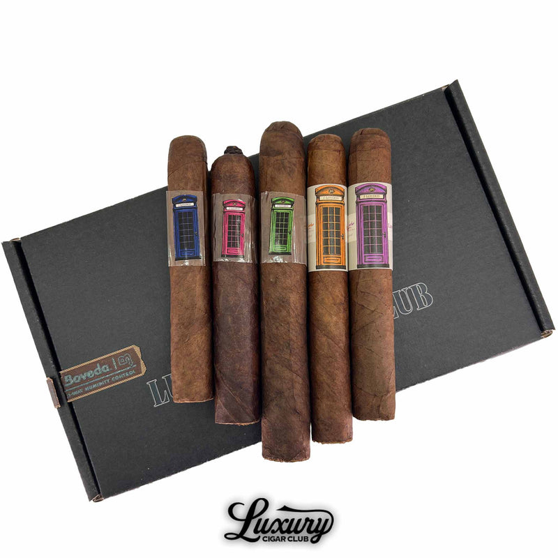Close-up of J. London Telephone Booth cigar sampler showing vibrant cigar bands and rich wrappers, displayed by Luxury Cigar Club.