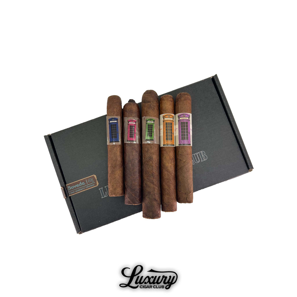 J. London Telephone Booth cigar sampler featuring five premium cigars with colorful band designs on a black Luxury Cigar Club box.