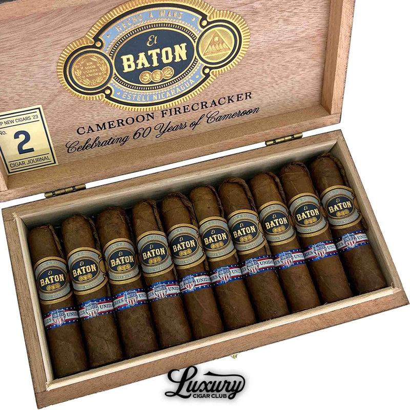 Close-up view of an open box of El Baton Cameroon Firecracker Petit Robusto cigars highlighting the intricate box lid design and smooth cigar wrappers, photographed by Luxury Cigar Club