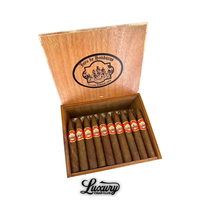 Open box of Joya de Honduras Torpedo cigars from Luxury Cigar Club, featuring ten tapered cigars with golden brown wrappers and classic red and gold detailing.