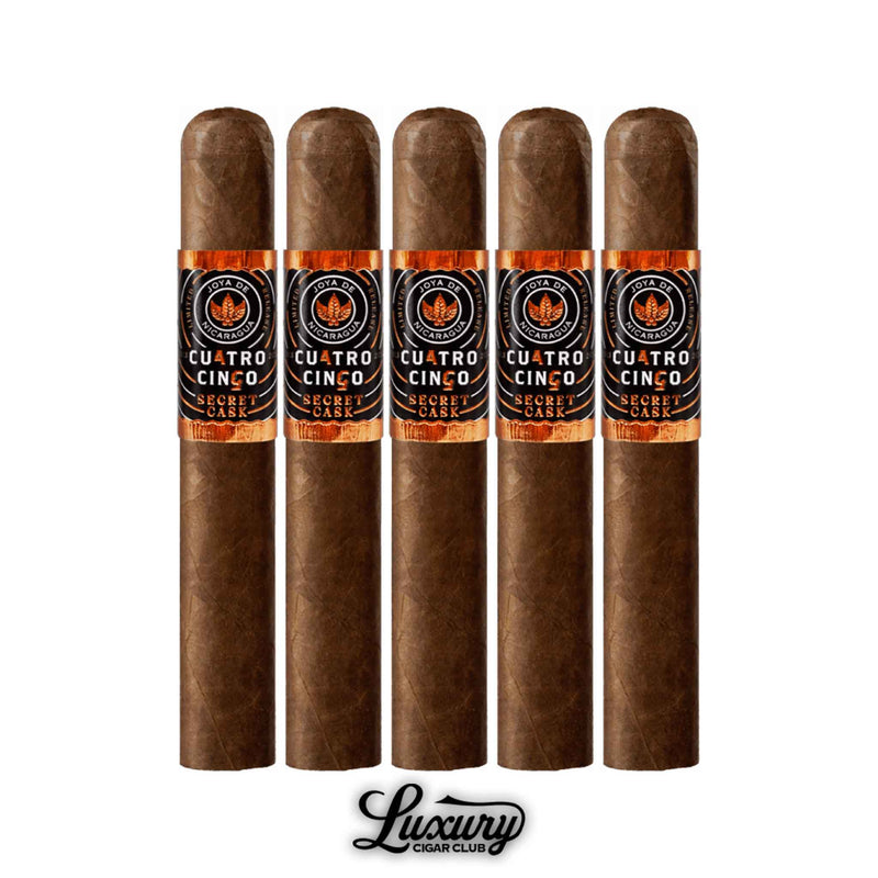 Five pack presentation of Joya de Nicaragua Cuatro Cinco Secret Cask Toro BP cigars standing upright with bands facing forward at Luxury Cigar Club.