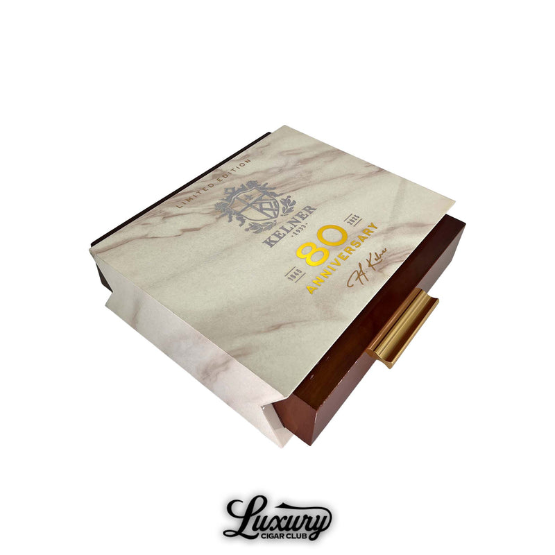 Luxury Cigar Club Kelner Limited Edition 80th Anniversary Diadema Fina closed presentation box with marble-pattern lid and gold accents.