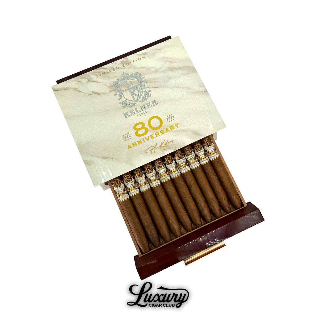 Luxury Cigar Club Kelner Limited Edition 80th Anniversary Diadema Fina cigars displayed in an open box with marble-pattern lid.