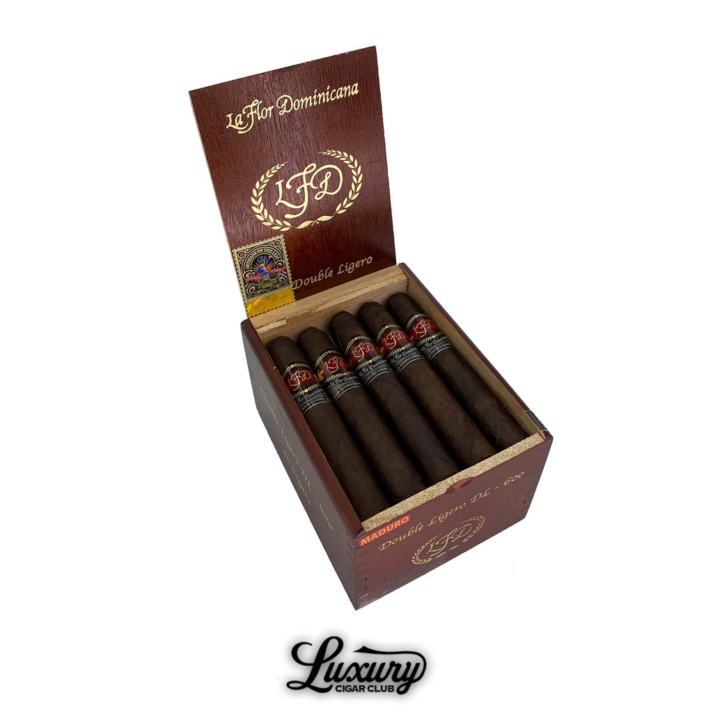La Flor Dominicana Double Ligero Maduro DL-600 cigars displayed in a rich wooden box with gold embossed branding, available at Luxury Cigar Club.