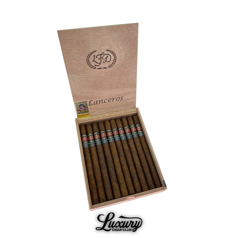La Flor Dominicana Double Ligero Natural Lancero cigars elegantly arranged in a wooden box, highlighting the long, slim vitola, featured at Luxury Cigar Club.