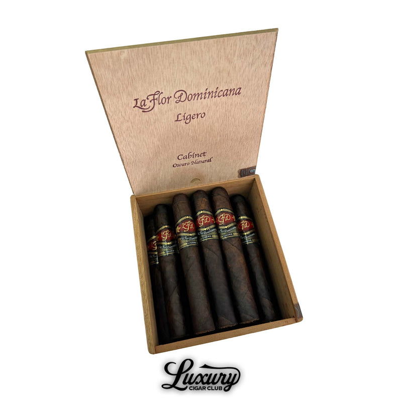 Open cedar box of La Flor Dominicana Ligero Oscuro Natural L-400 cigars with bold red and black bands displayed by Luxury Cigar Club.