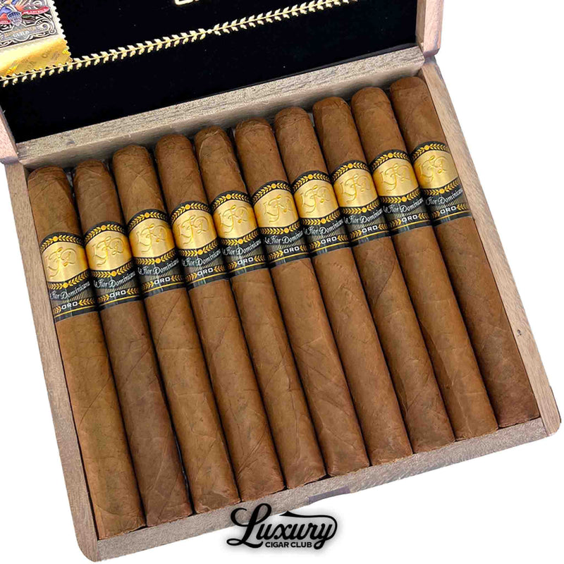 Close up view of La Flor Dominicana Oro Natural No 5 cigars showing detailed gold and black Oro bands from Luxury Cigar Club