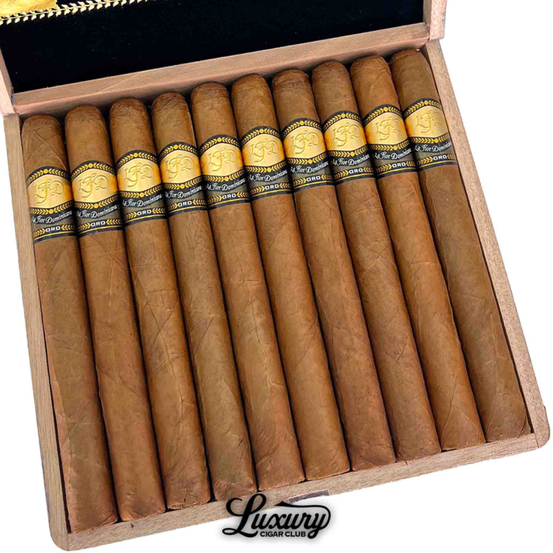 Close up of La Flor Dominicana Oro Natural No 7 cigars highlighting the natural wrappers and signature gold Oro bands from Luxury Cigar Club