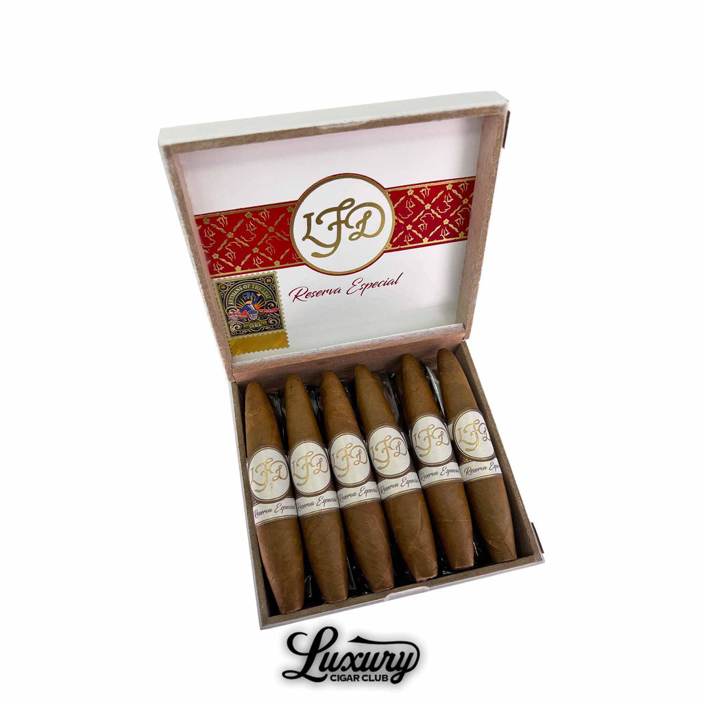 La Flor Dominicana Reserva Especial El Jocko cigars neatly arranged in a white and red box with gold detailing, presented by Luxury Cigar Club.