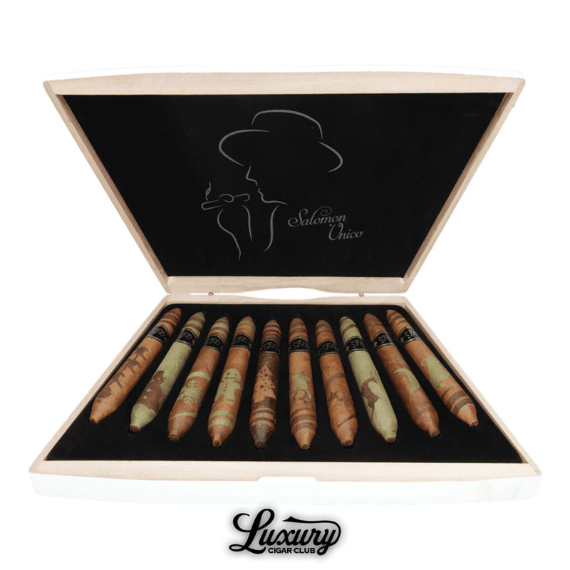 Open box of La Flor Dominicana Salomon Unico Limited Edition cigars showcasing various artistic wrapper patterns, each uniquely crafted, presented by Luxury Cigar Club.