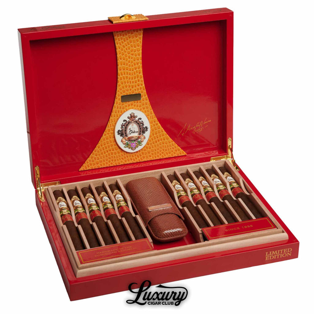 Open box of La Galera Year of the Snake Limited Edition 2025 Churchill cigars revealing meticulously crafted cigars and an included brown textured leather case, symbolizing luxury and craftsmanship.