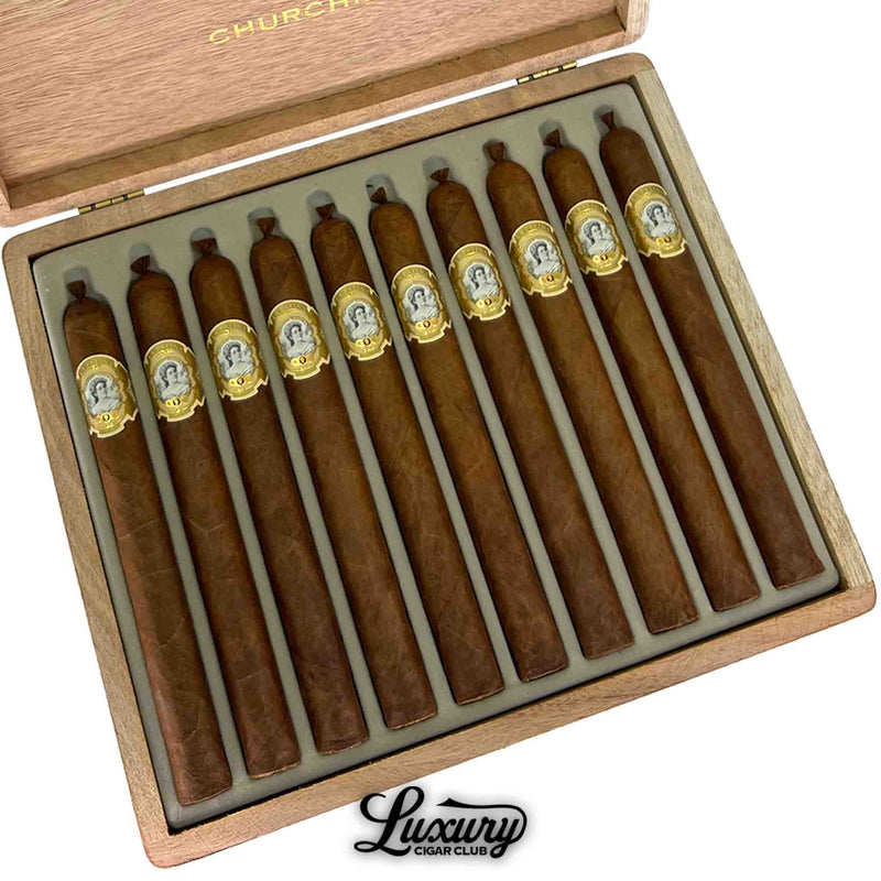 Close-up of La Palina Goldie Churchill Cigars in a 10-count box, featuring elegant golden bands and traditional craftsmanship.