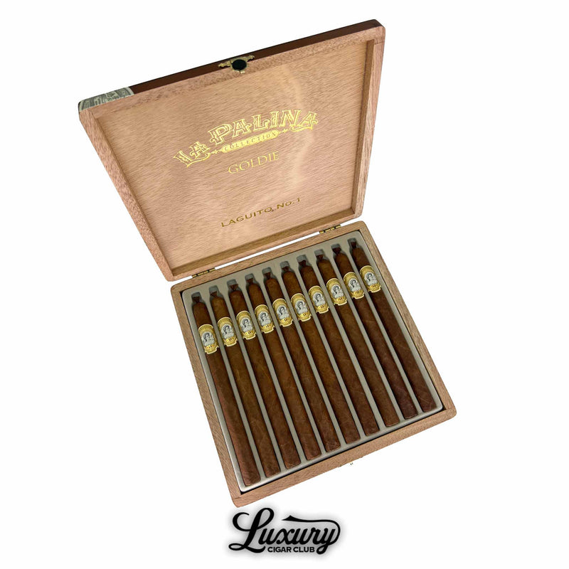Open box of La Palina Goldie Laguito No. 1 cigars, featuring slender hand-rolled cigars with gold and white bands – Luxury Cigar Club.