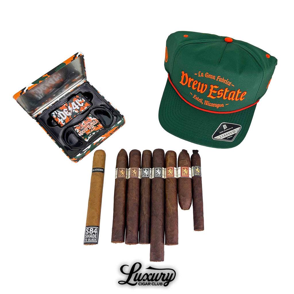 Liga Privada Black Friday 2025 Freebie Sampler No 2 featuring assorted Drew Estate cigars hat and camo accessory case presented by Luxury Cigar Club