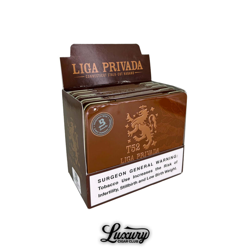Display box of Drew Estate Liga Privada T52 Coronets cigar tins with embossed brown tin design, Boveda humidity seal, and Luxury Cigar Club logo