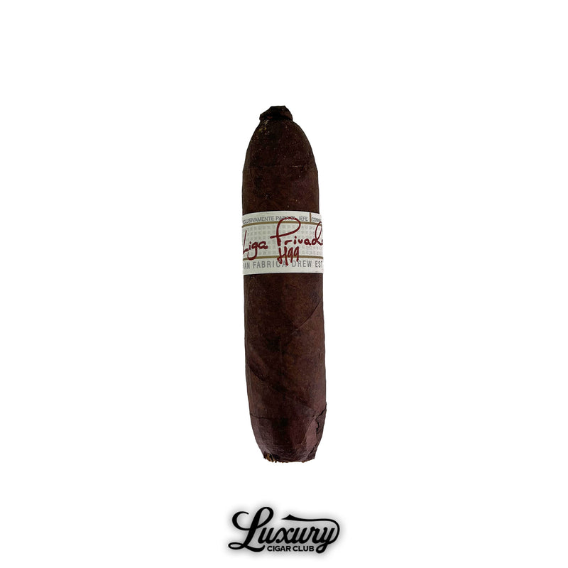 Single Liga Privada H99 Flying Pig cigar with rich dark wrapper and distinctive Liga Privada band.